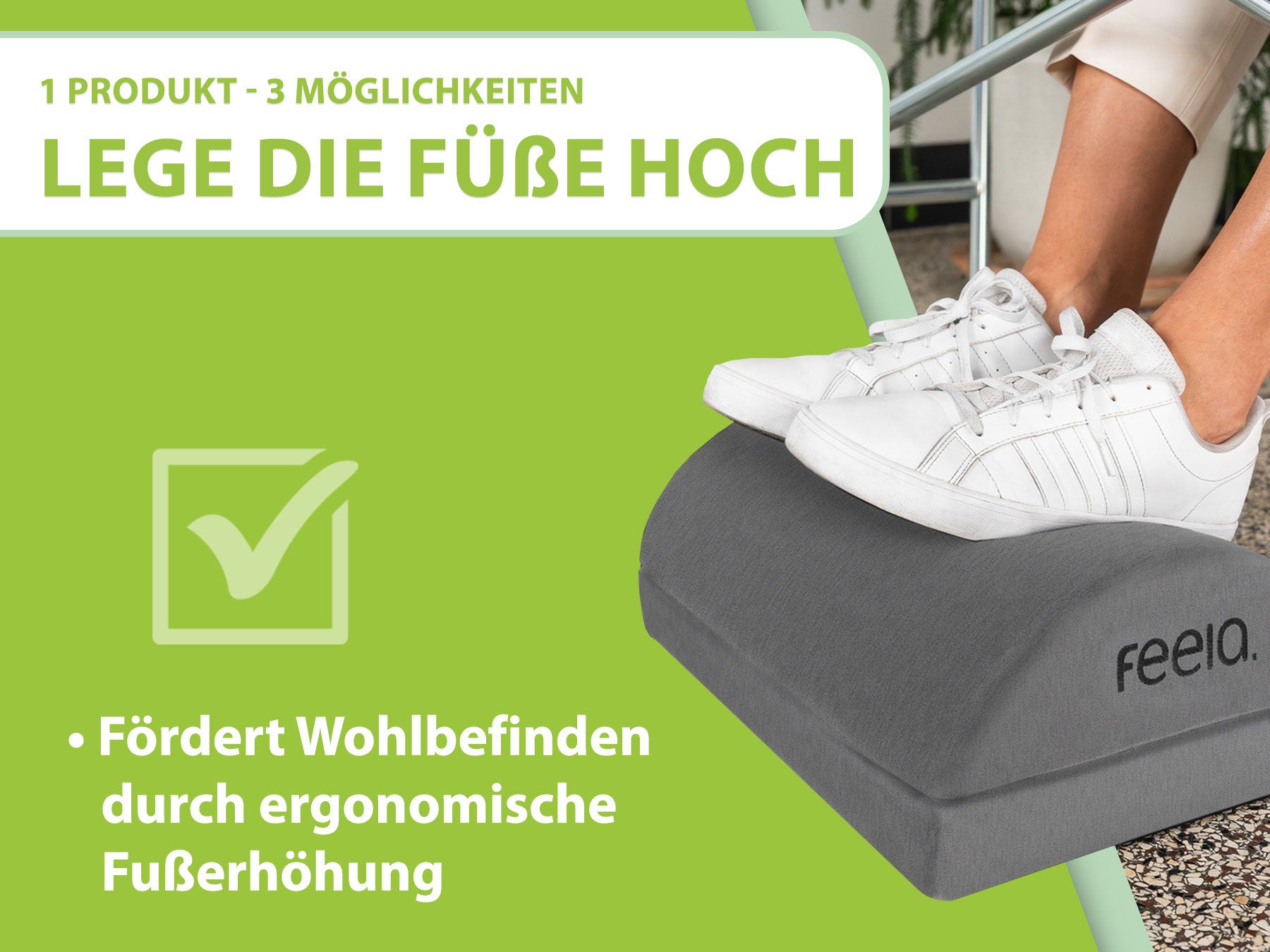 Dunkelgraue ergonomische Fußstütze von feela, dargestellt als vielseitig einsetzbar für gesundes Sitzen